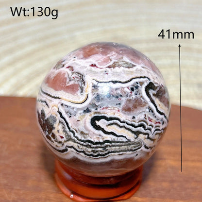 Rhodochrosite Sphere – Natural Pink Elegance